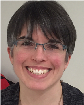 An image of Dana Vanzanten, a white woman with short brown hair and glasses. 