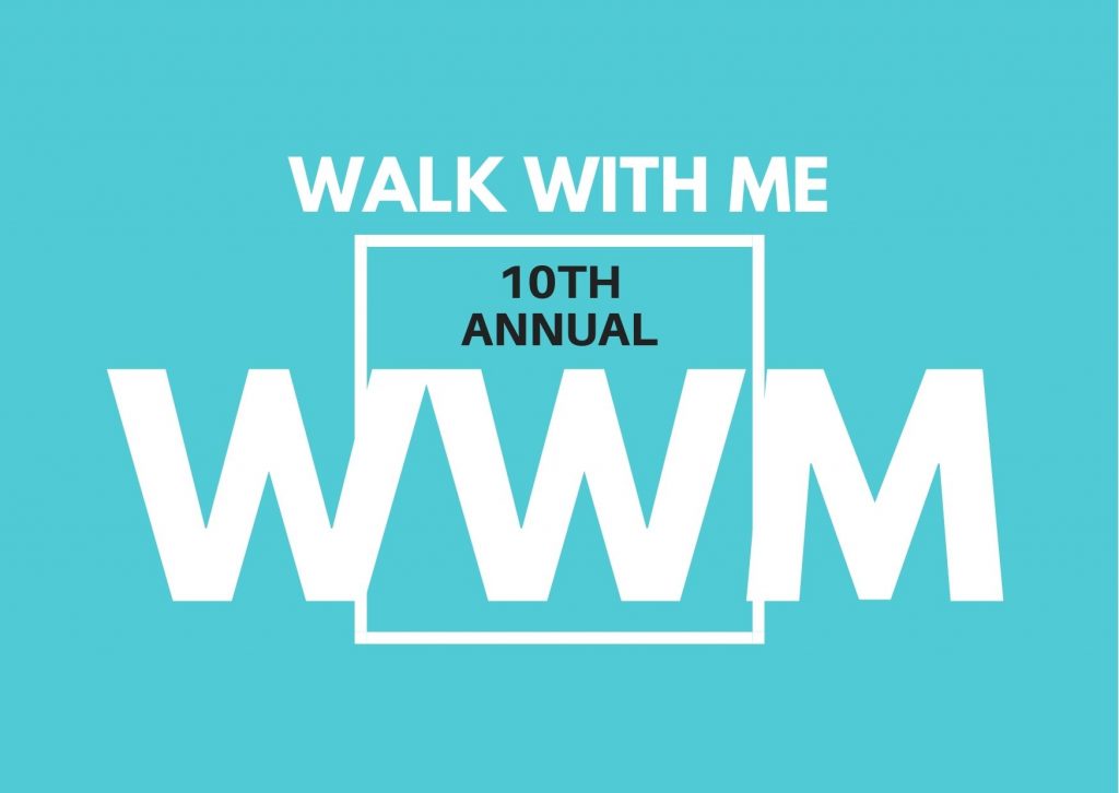 The logo for the 10th Annual Walk With Me Event. It is clean white text on a light blue background. 